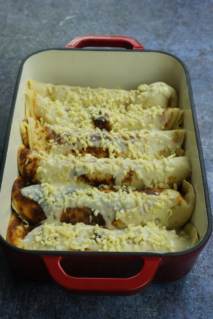 Enameled cast iron coasting pan baking dish from Crucible Cookware with baked crepes