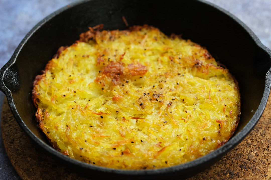 Rösti in a cast iron skillet