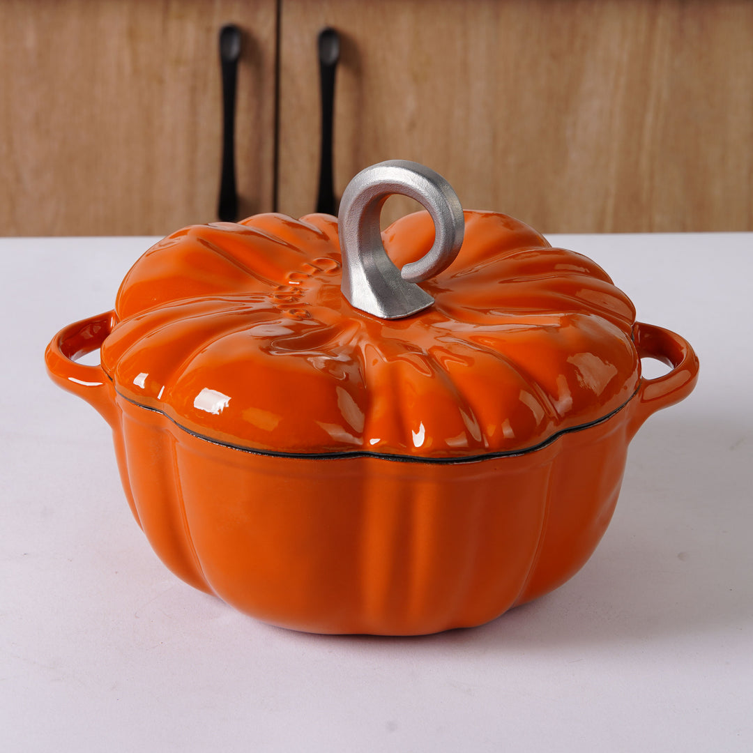 Enameled Cast Iron Pumpkin Pot in orange color and silver knob