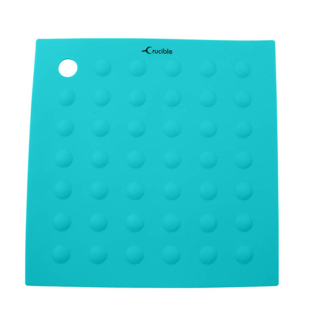 Silicone trivet in turquoise color