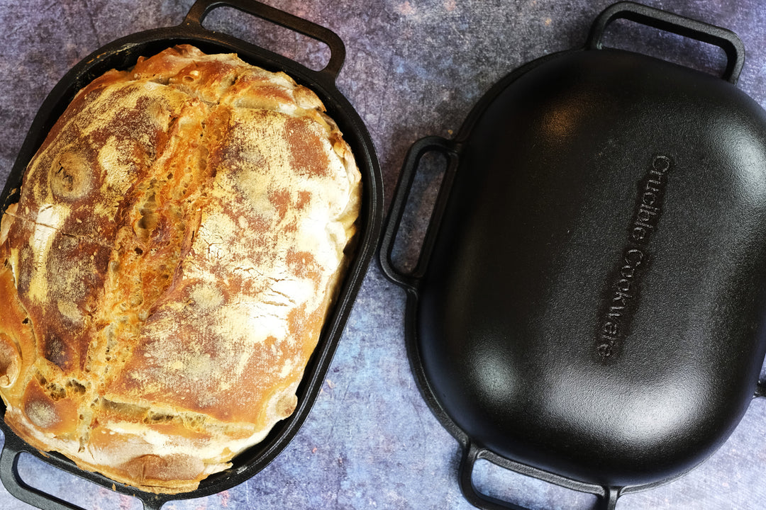 cast iron bread pan with lid with sourdough bread